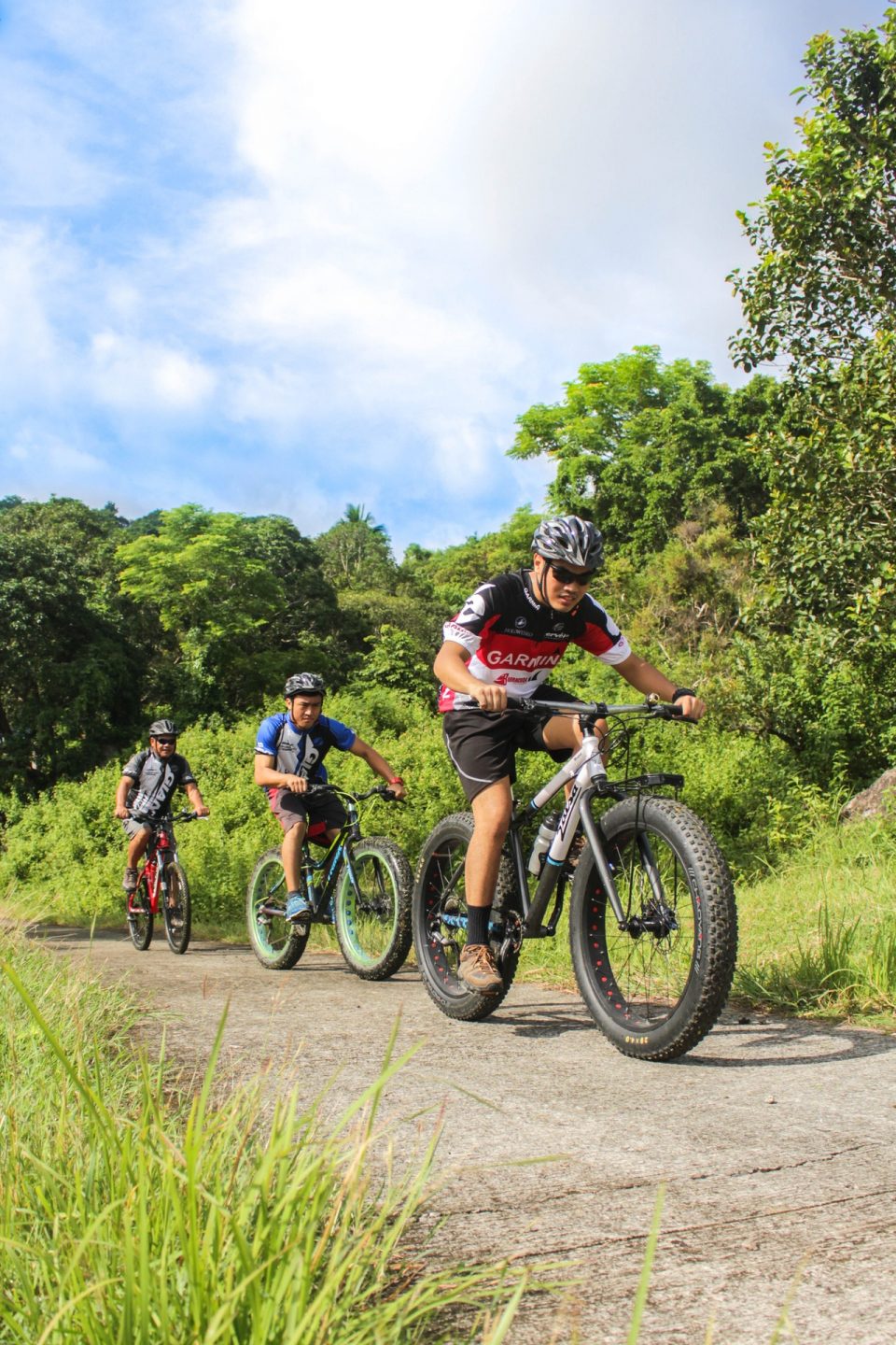 three-men-riding-on-bicycles-2158963